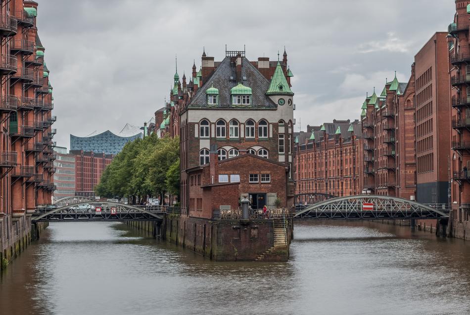 red houses by the river and bridges