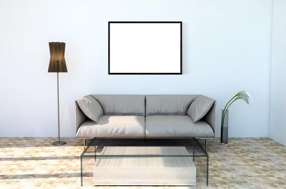the gray sofa in the room and the painting