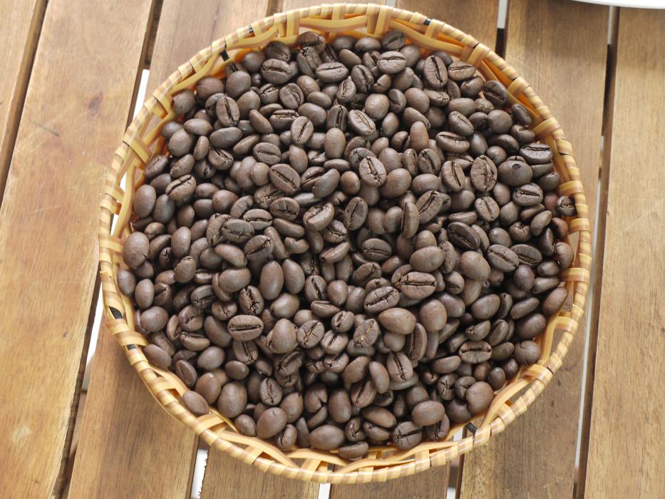 ripe aromatic coffee beans in a basket