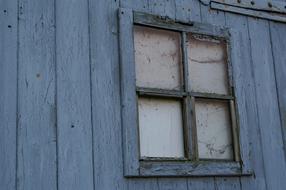 old boarded up window