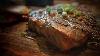 Juicy meat in sauce with vegetables