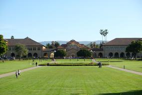 large green field with houses