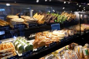 sweet delicious baked goods in a display case