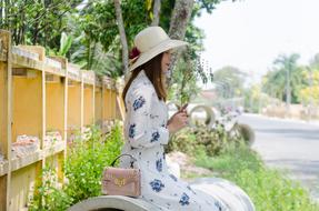 Beautiful Girl in hat on street