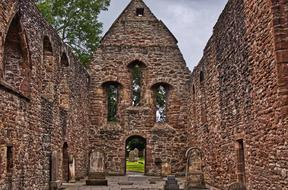 old ruins of a brownstone building