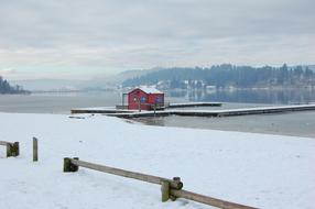 red house in the snow view