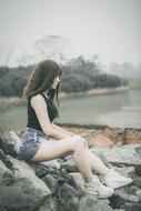 Girl Rocks Dam