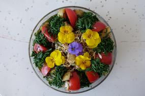 Vegetable salad decorated with flowers