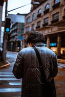 man in a jacket on the street