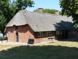 stone house with a roof view