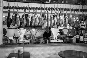man sells meat in a store