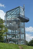 glass house in a field