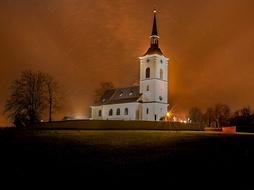 white church in an orange sky