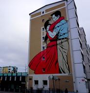 beautiful couple drawing on the house