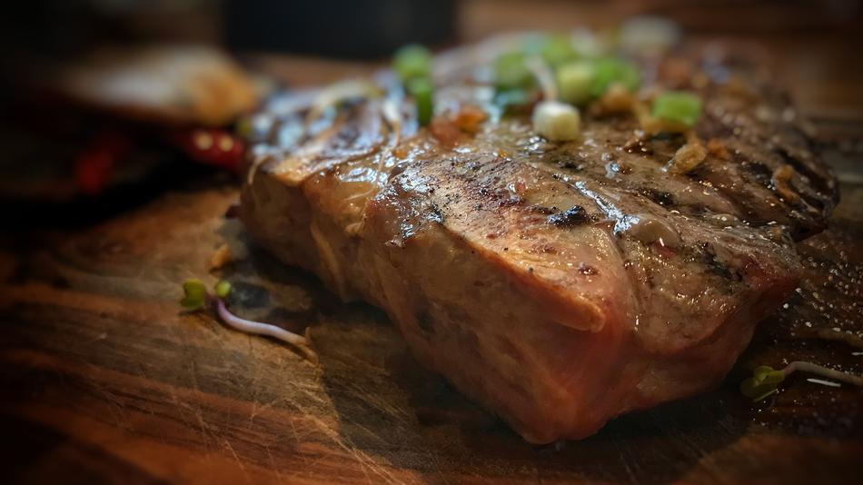 Juicy meat in sauce with vegetables