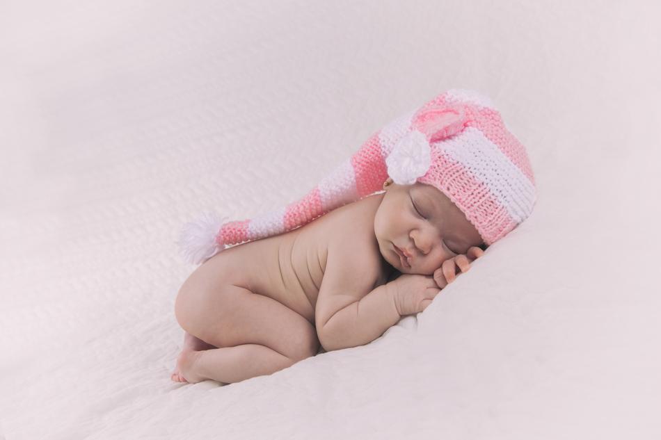 sleeping baby in a cute hat
