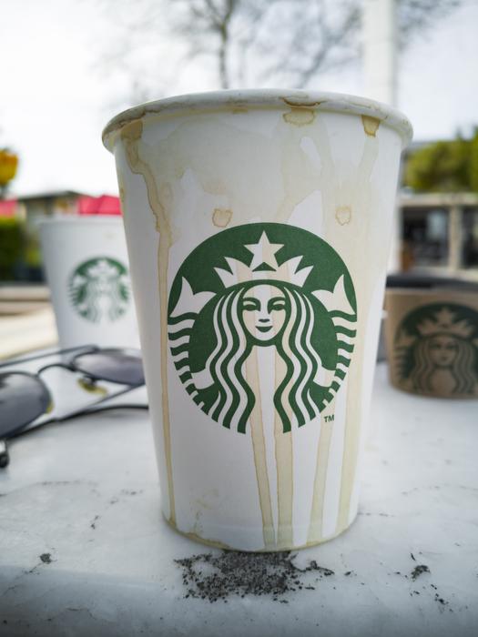 glass of starbucks coffee on the table