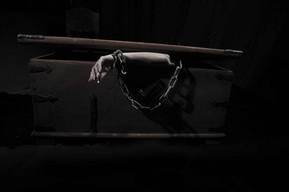 the girl's hand in the coffin