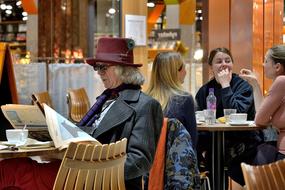 Man Reading Newspaper