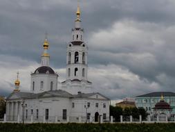 white church with clouds