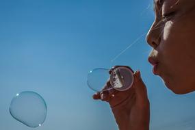 Girl Soap Bubbles Blow