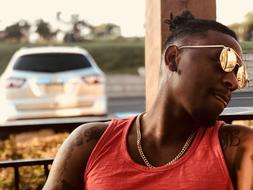 Man with golden sunGlasses