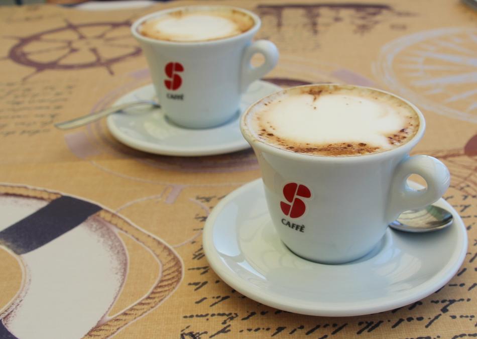 hot coffee with milk foam