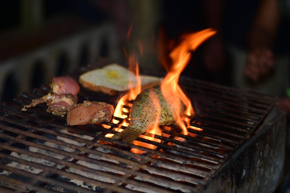 grilled fish on fire