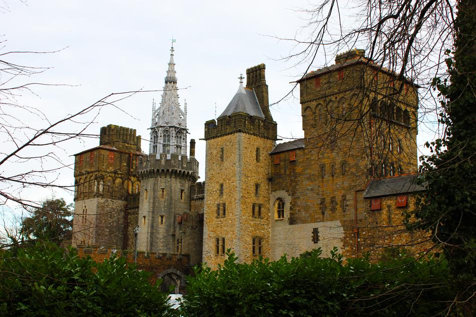 old castle yellow with bushes