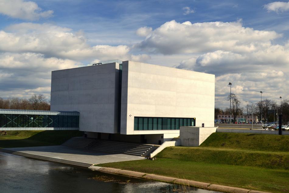 white building on green grass