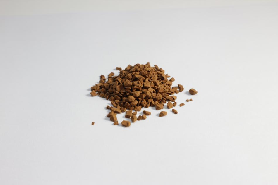 Handful of coffee beans on a white background