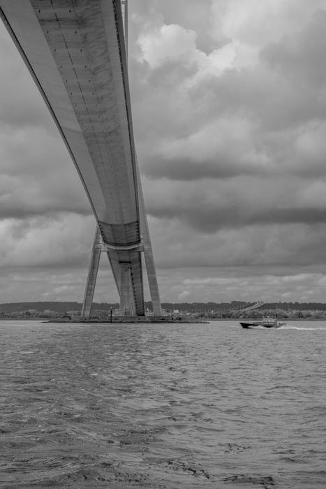 long bridge on the beach by the sea