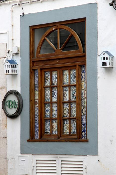 wooden frame on the window in the house