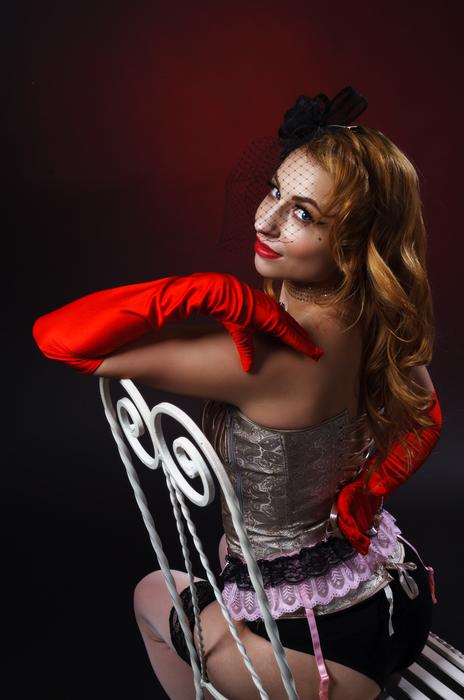 an unusual girl in a chair