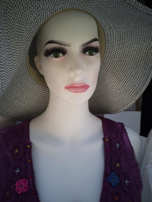 makeup mannequin with a hat