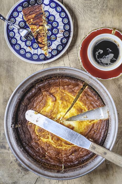 sweet cheesecake with coffee on the table