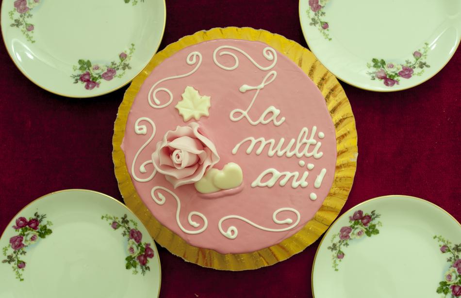 pink cake decorated with a rose
