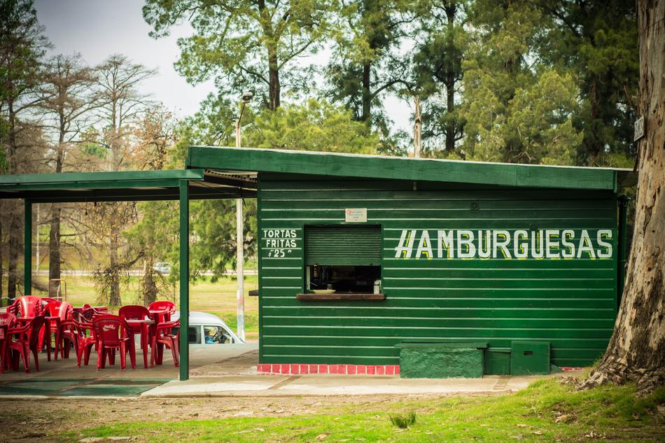 green cafe building with burgers