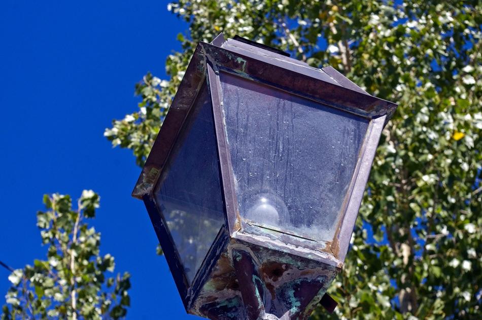 old lantern against the grass
